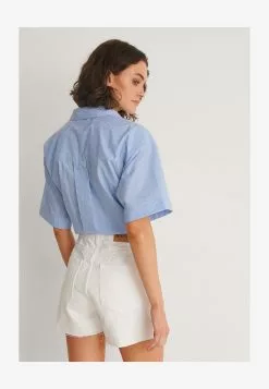 NA-KD RAW HEM BUTTONED - Jeans Shorts - White 7 NA-KD RAW HEM BUTTONED - Jeans Shorts - White -Hosen Elegante Boutique 9bc8937c00a2409b9712a2ef2da0a2a5