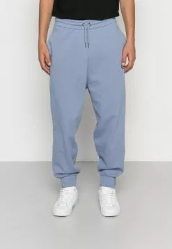 Karl Kani SMALL SIGNATURE UNISEX - Jogginghose - Blue -Hosen Elegante Boutique f86012923a3f44ce8fd6c36766d7ce5b 1
